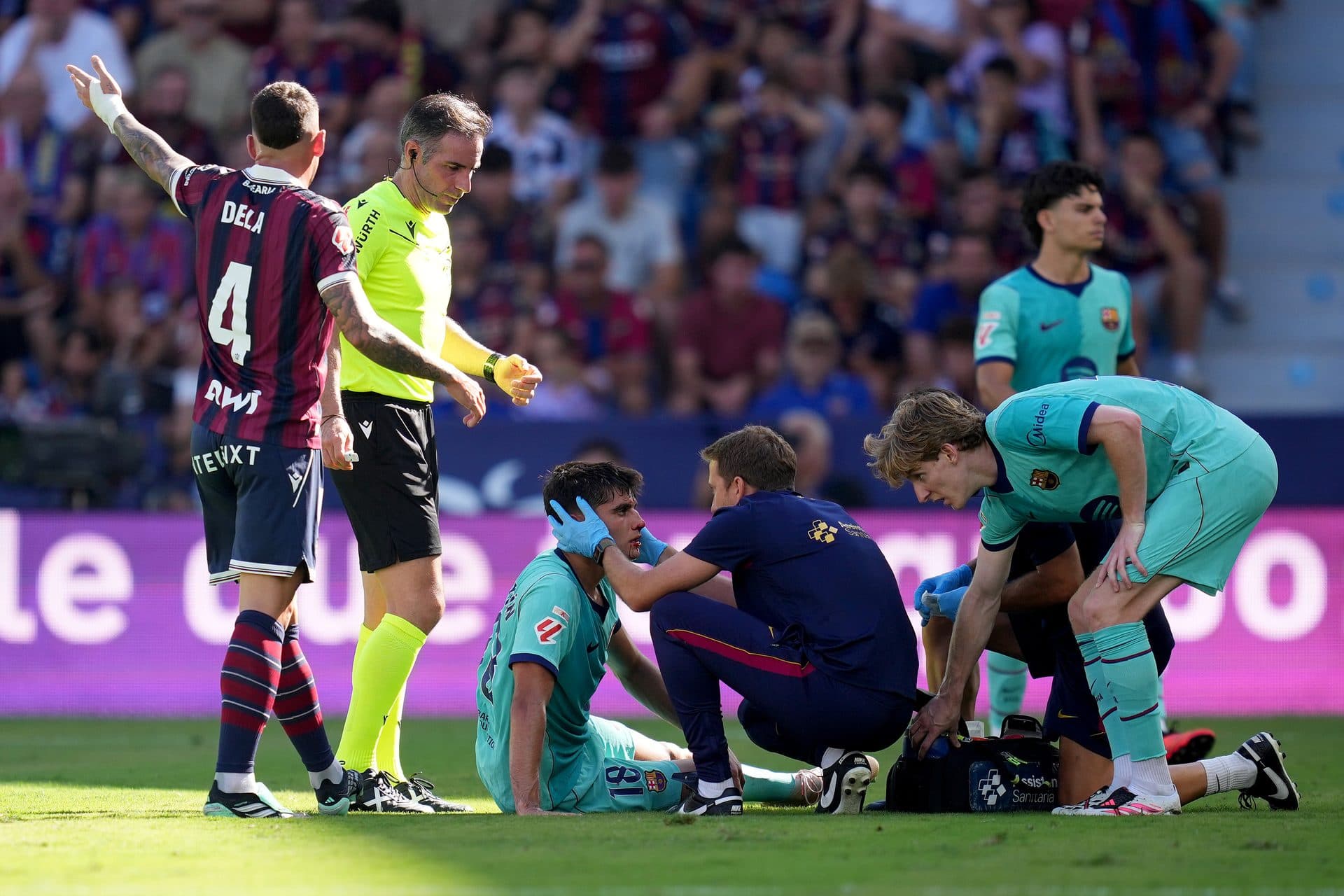 Video: Barcelona defender Gerard Martin left bleeding after painful incident against Levante