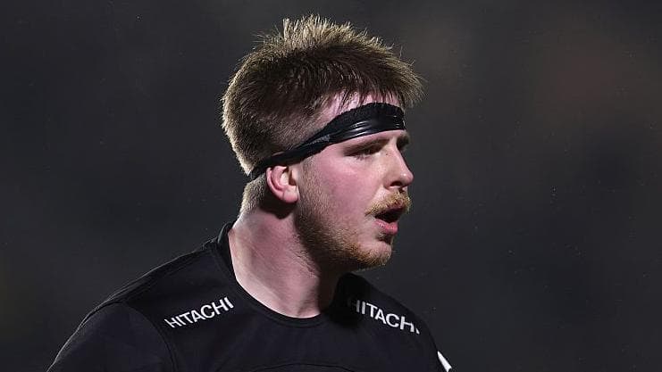 Young forward Baker signs new Newcastle contract