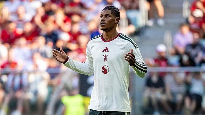 Rashford return 'solid, not spectacular'