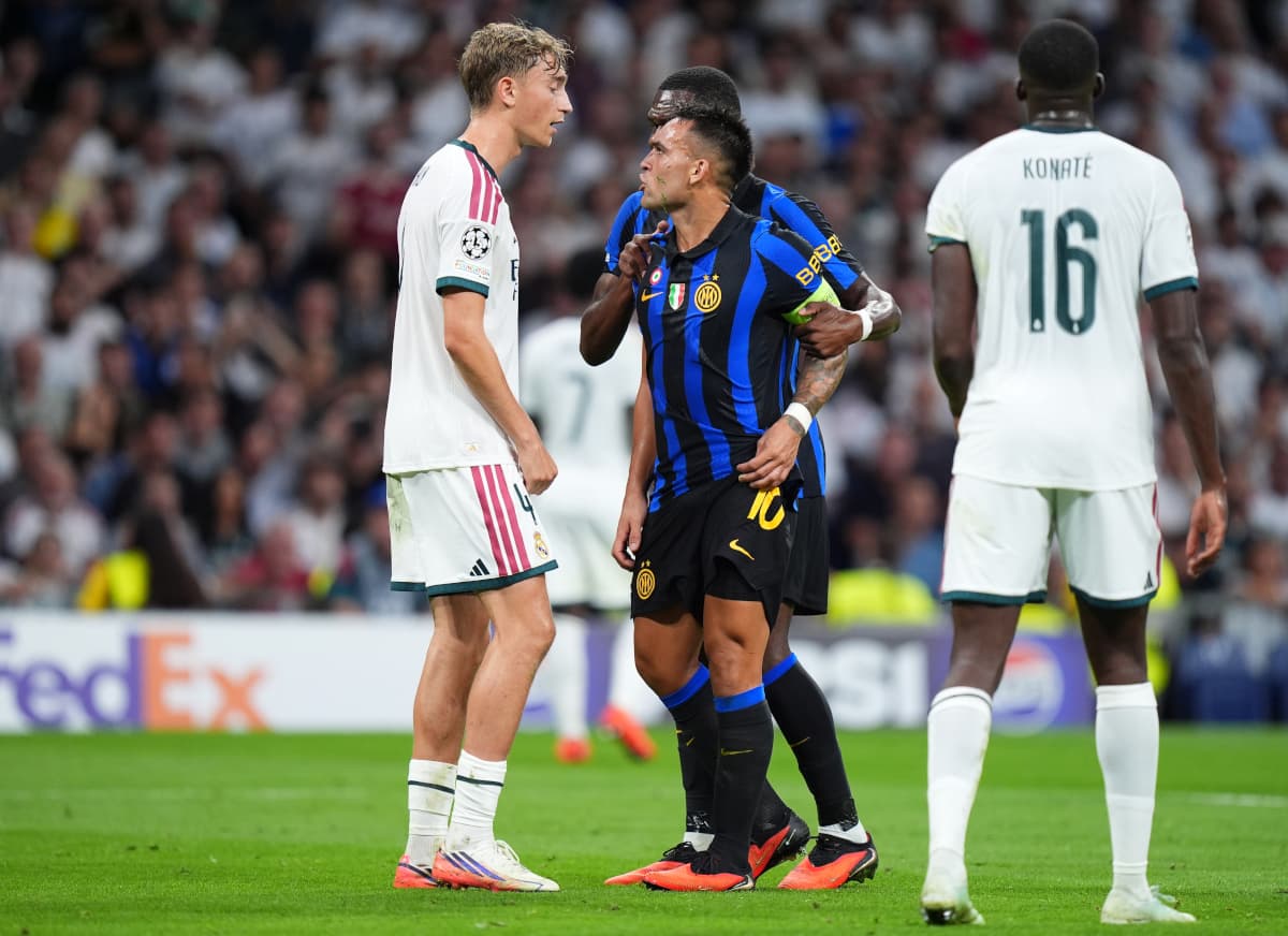 Huijsen’s Italian exchange with Barella during tense Real Madrid-Inter clash as fake news surfaces