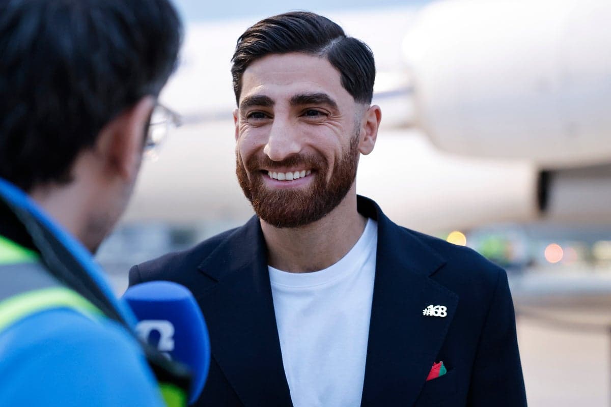 Iran’s World Cup players wear #168 lapel pins as they arrive in Mexico