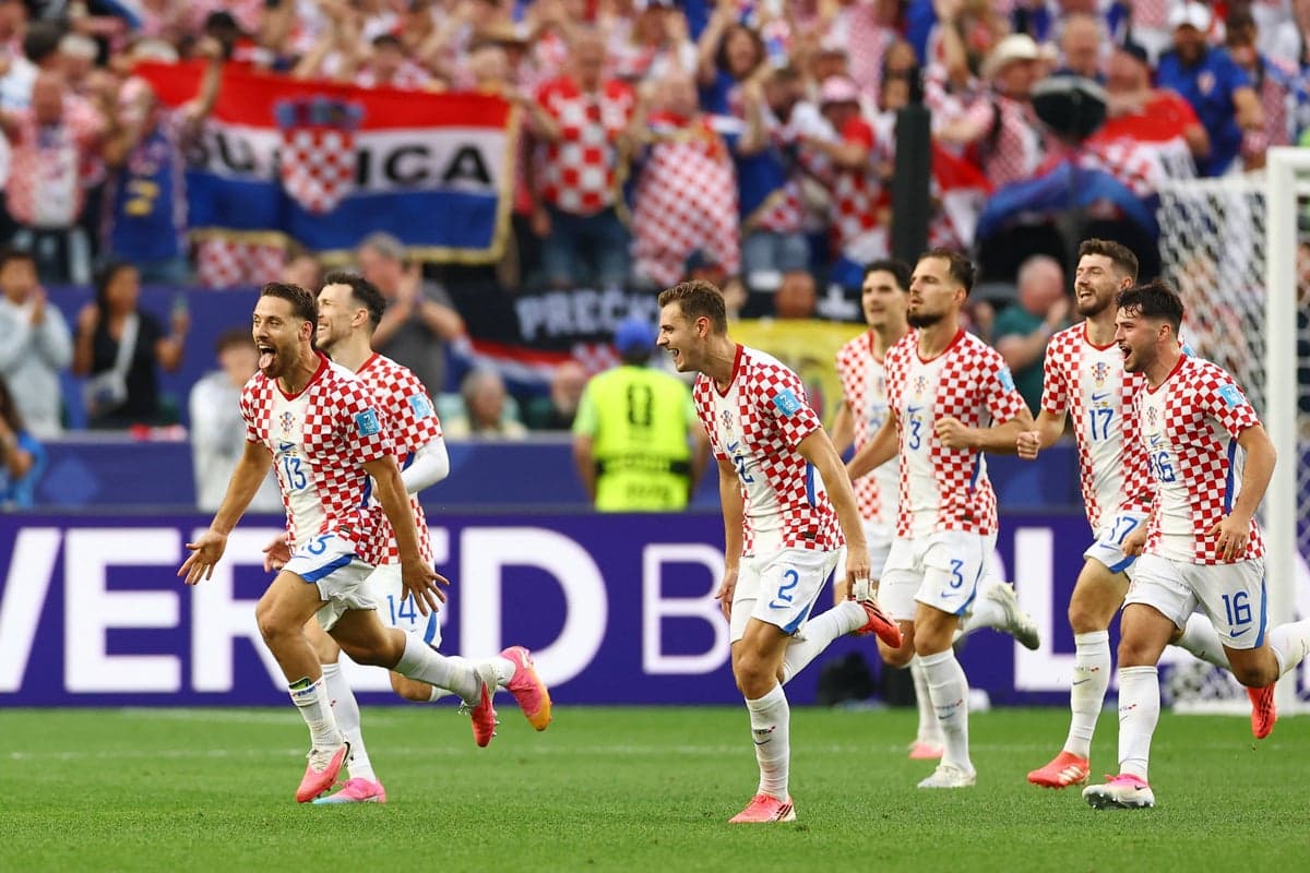 Croatia battle by Ghana to finish second in group – and knock out Scotland