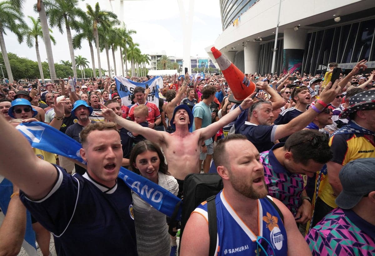 Scotland fans bring World Cup party to Miami as thousands march to local baseball match